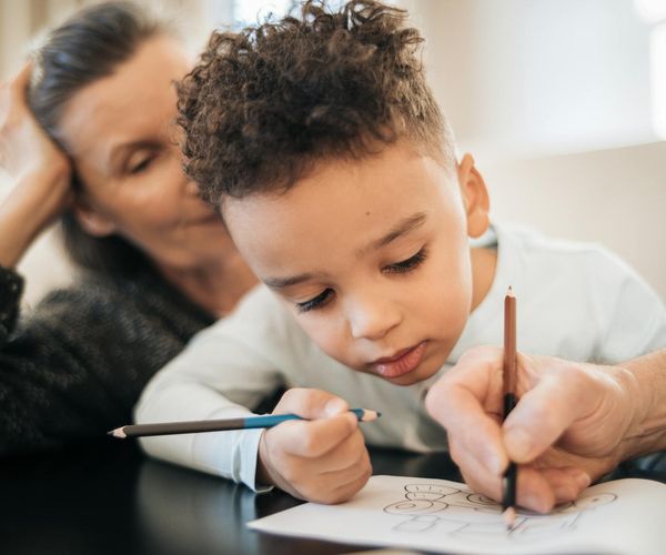 Person of middle age performing a gentle stretching exercise in a bright room.